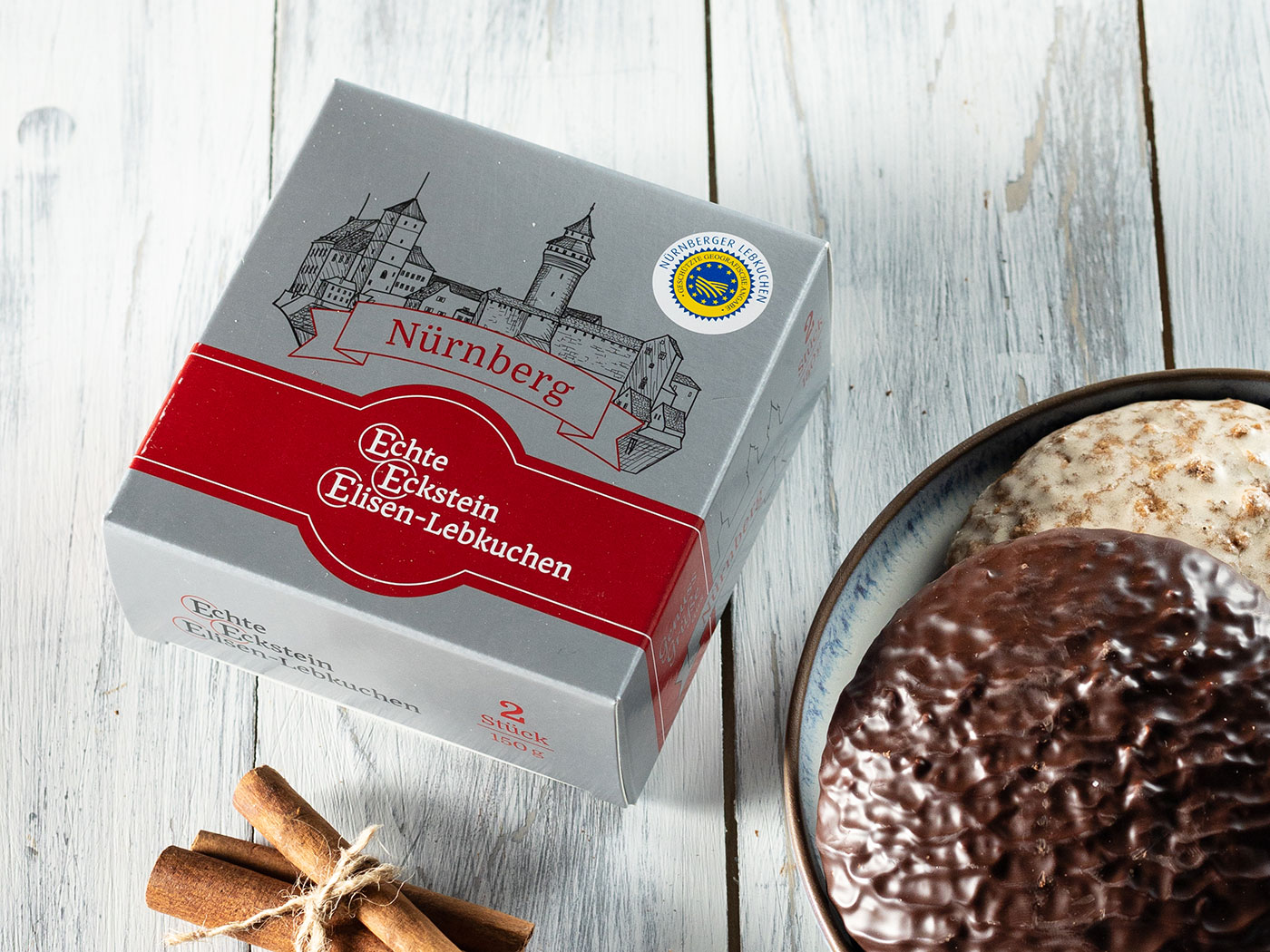 Karton 2 er Präsentkarton 10 Stück Echte Eckstein Elisenlebkuchen gemischt g.g.A. Karton 2 er Präsentkarton 10 Stück Echte Eckstein Elisenlebkuchen gemischt g.g.A.